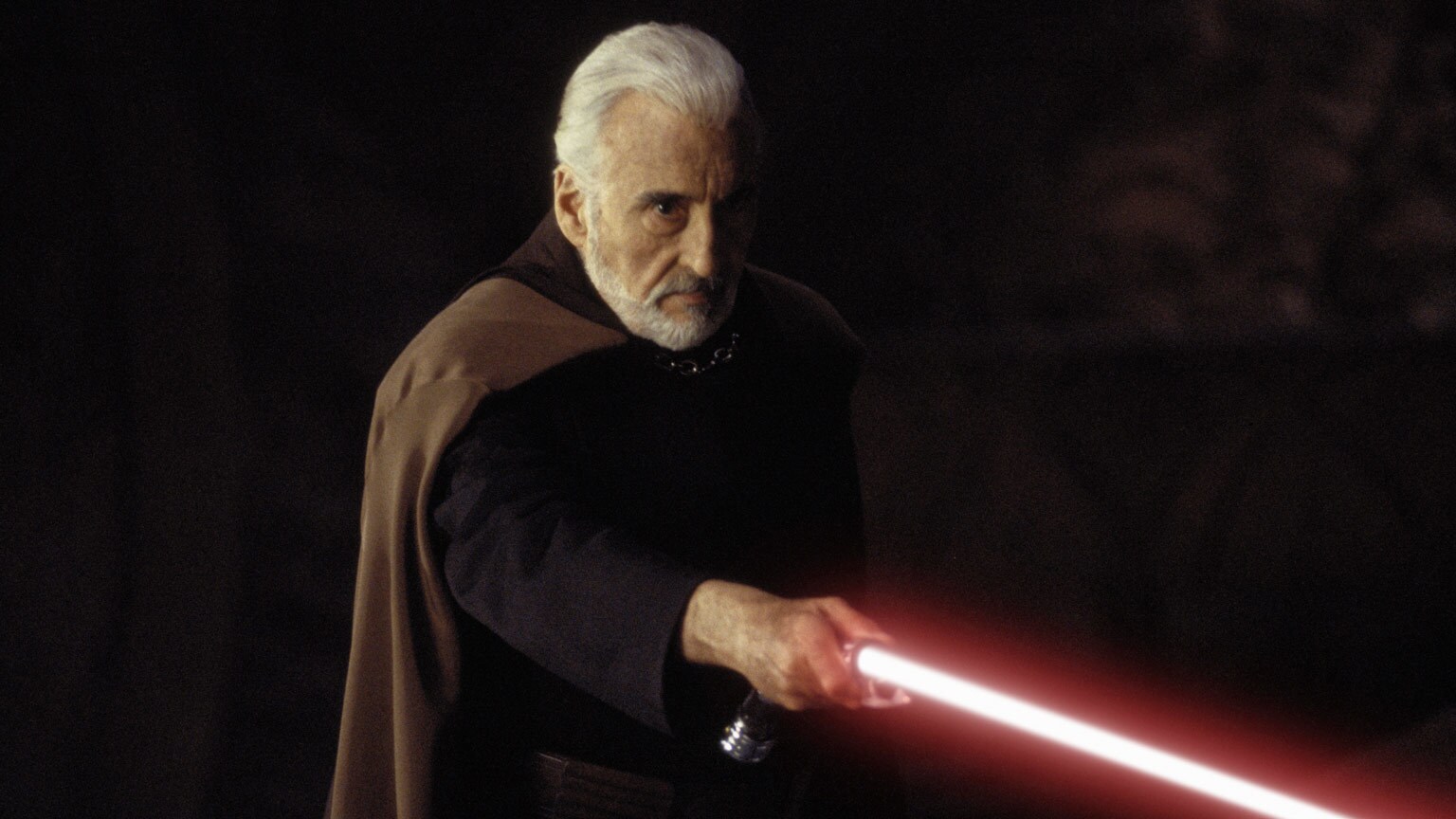 Count Dooku with his lightsaber ignited in Star Wars: Attack of the Clones.