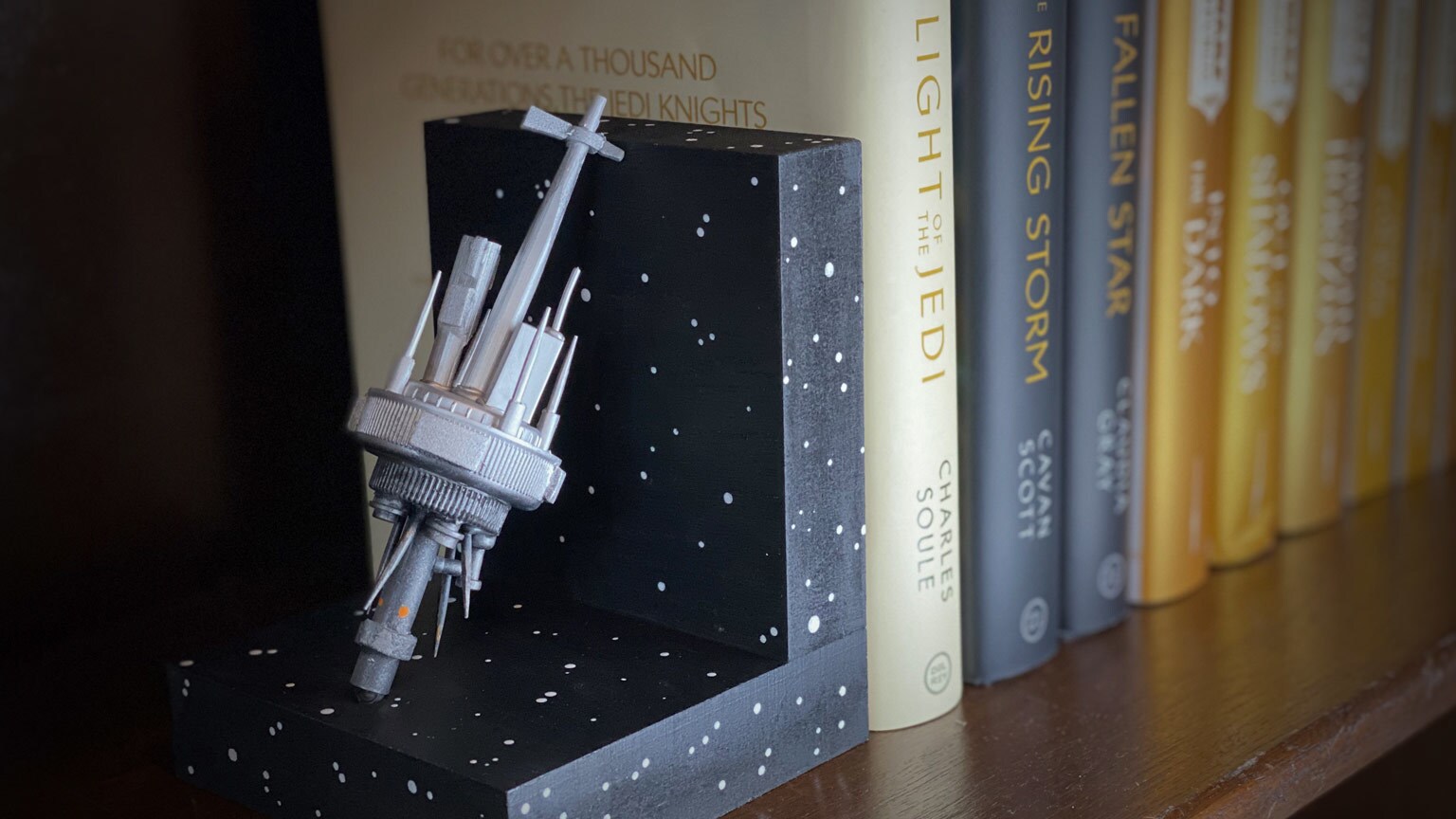 Bring Light and Life to Your Collection with This Starlight Beacon DIY Bookend