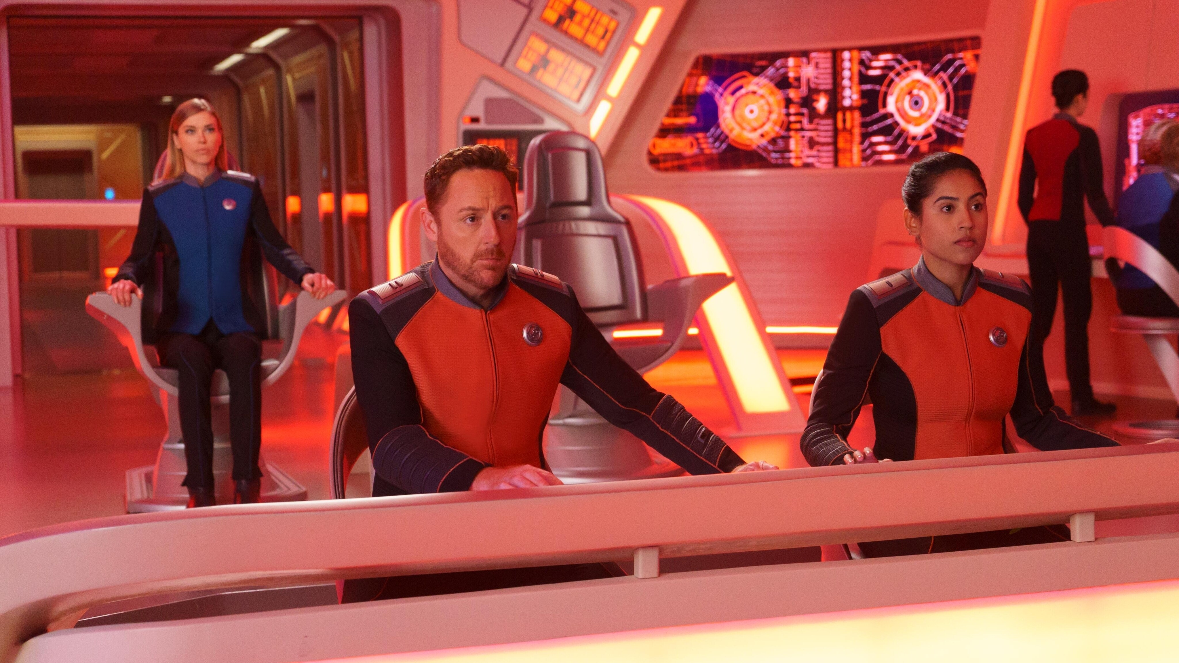The Orville: New Horizons -- “Gently Falling Rain” - Episode 304 -- The Orville crew leads a Union delegation to sign a peace treaty with the Krill. Cmdr. Kelly Grayson (Adrianne Palicki) and Lt. Gordon Malloy (Scott Grimes), shown. (Photo by: Kevin Estrada/Hulu)