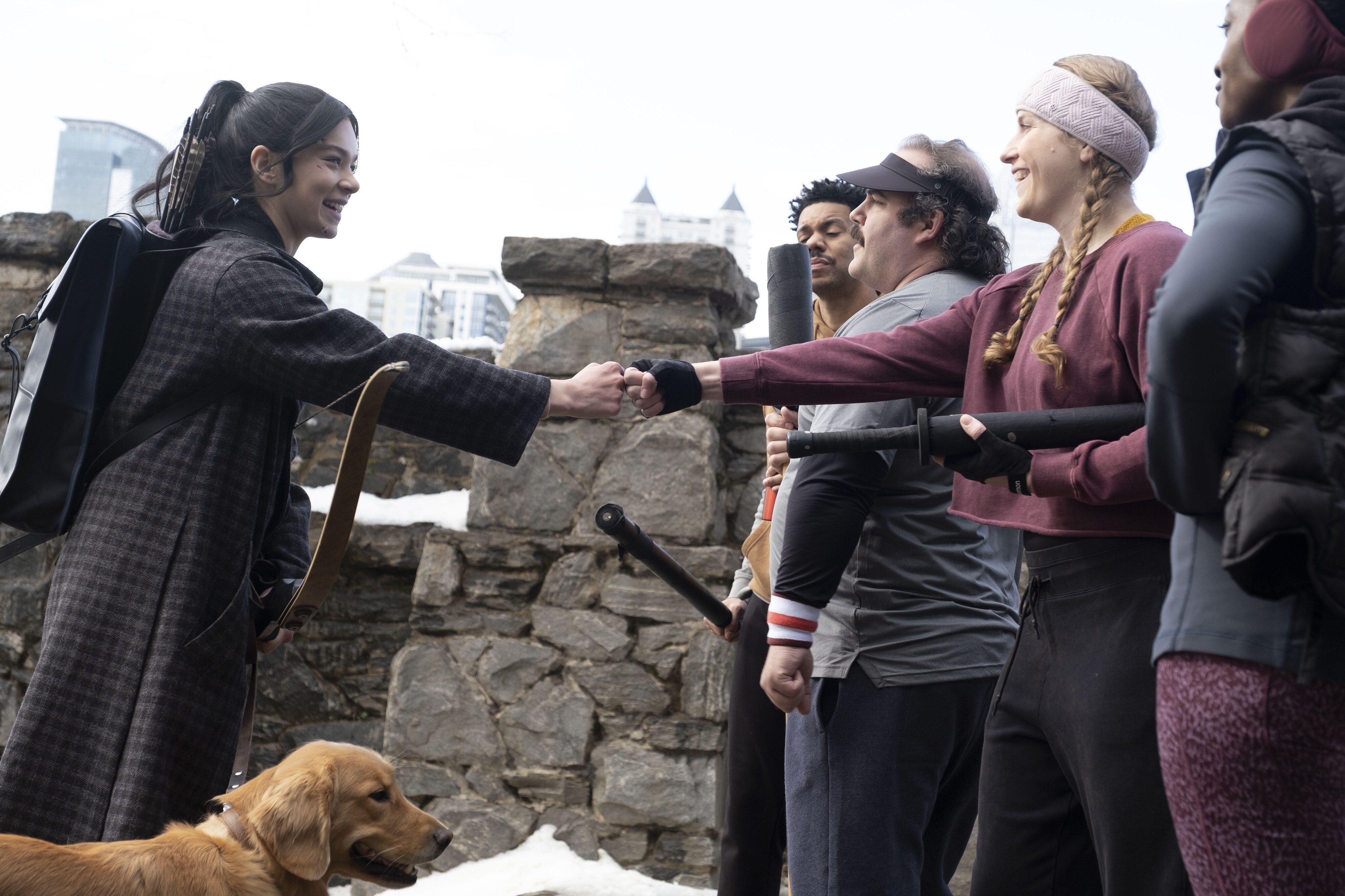Hailee Steinfeld as Kate Bishop, The Pizza Dog, Clayton English as Grill, Robert Walker Branchaud as Orville, Adelle Drahos as Missy, and Adetinpo Thomas as Wendy in Marvel Studios' HAWKEYE. Photo by Chuck Zlotnick. ©Marvel Studios 2021. All Rights Reserved.
