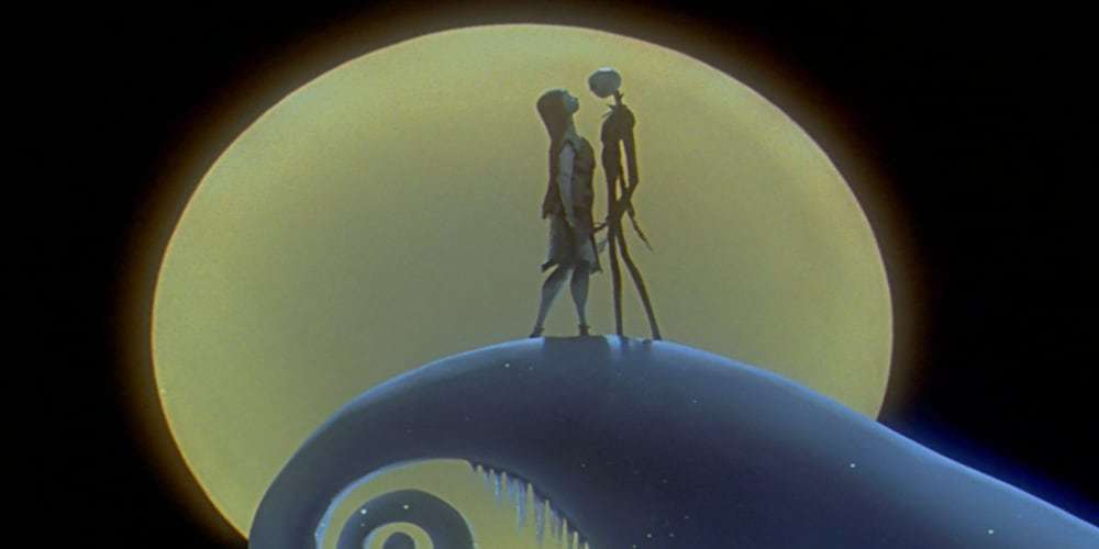Sally and Jack Skellington standing in front of the moon in the movie "The Nightmare Before Christmas"