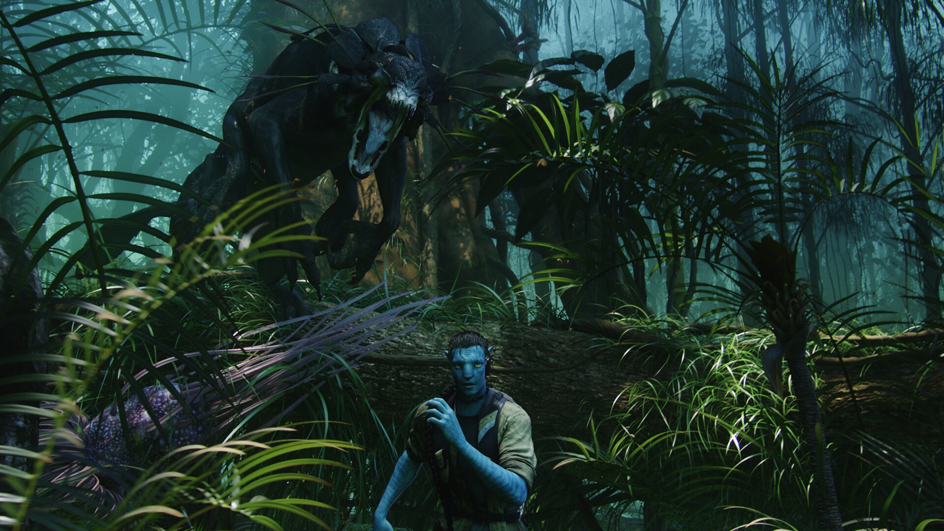 A Palulukan (creature native to Pandora) is pictured in the air, about to pounce on an unaware Na'vi man.