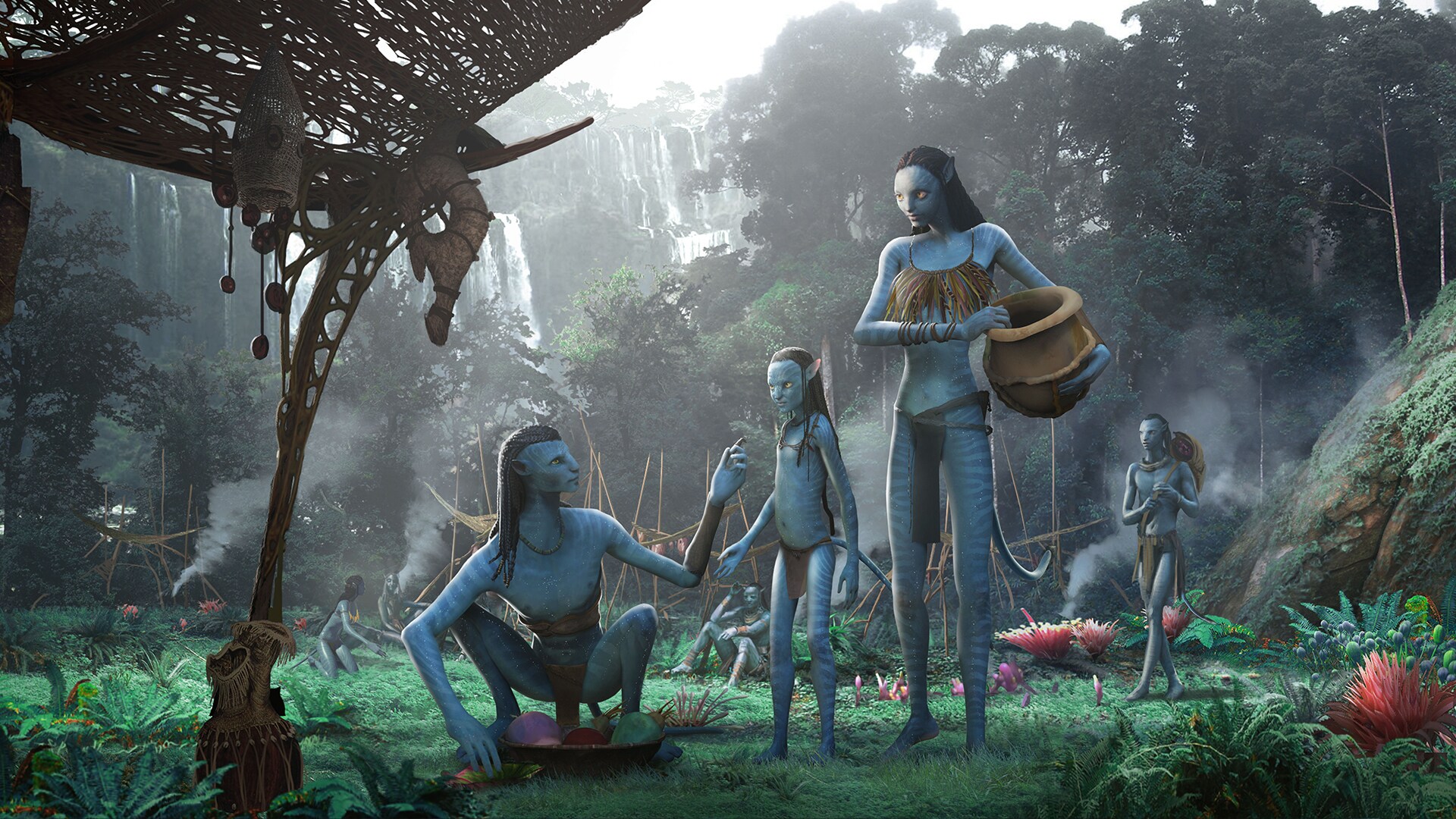 Image of several members of the Na'vi clan gathering food outside.