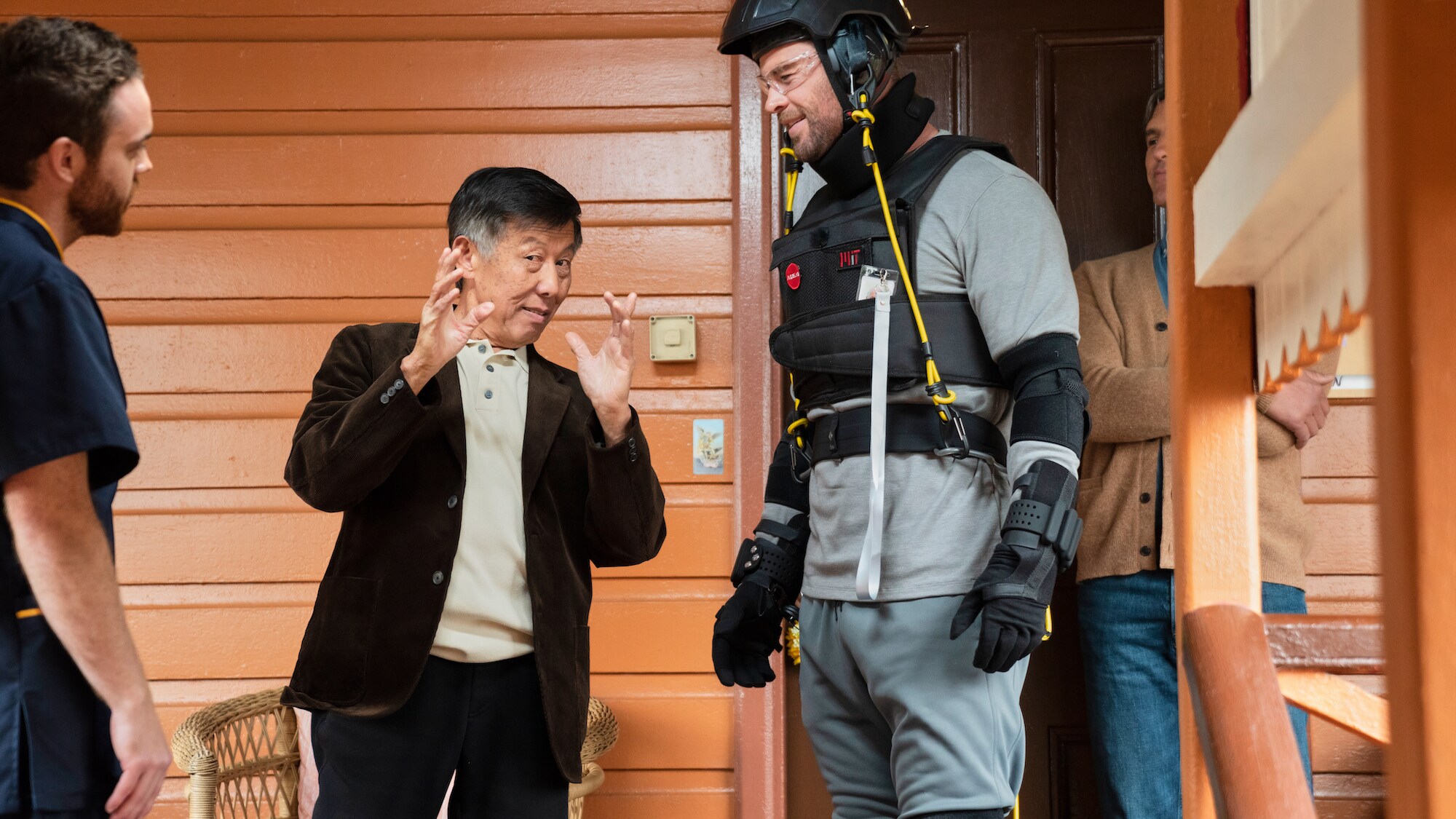 Michael introduces Chris Hemsworth to a resident, Gary. (National Geographic for Disney+/Craig Parry)