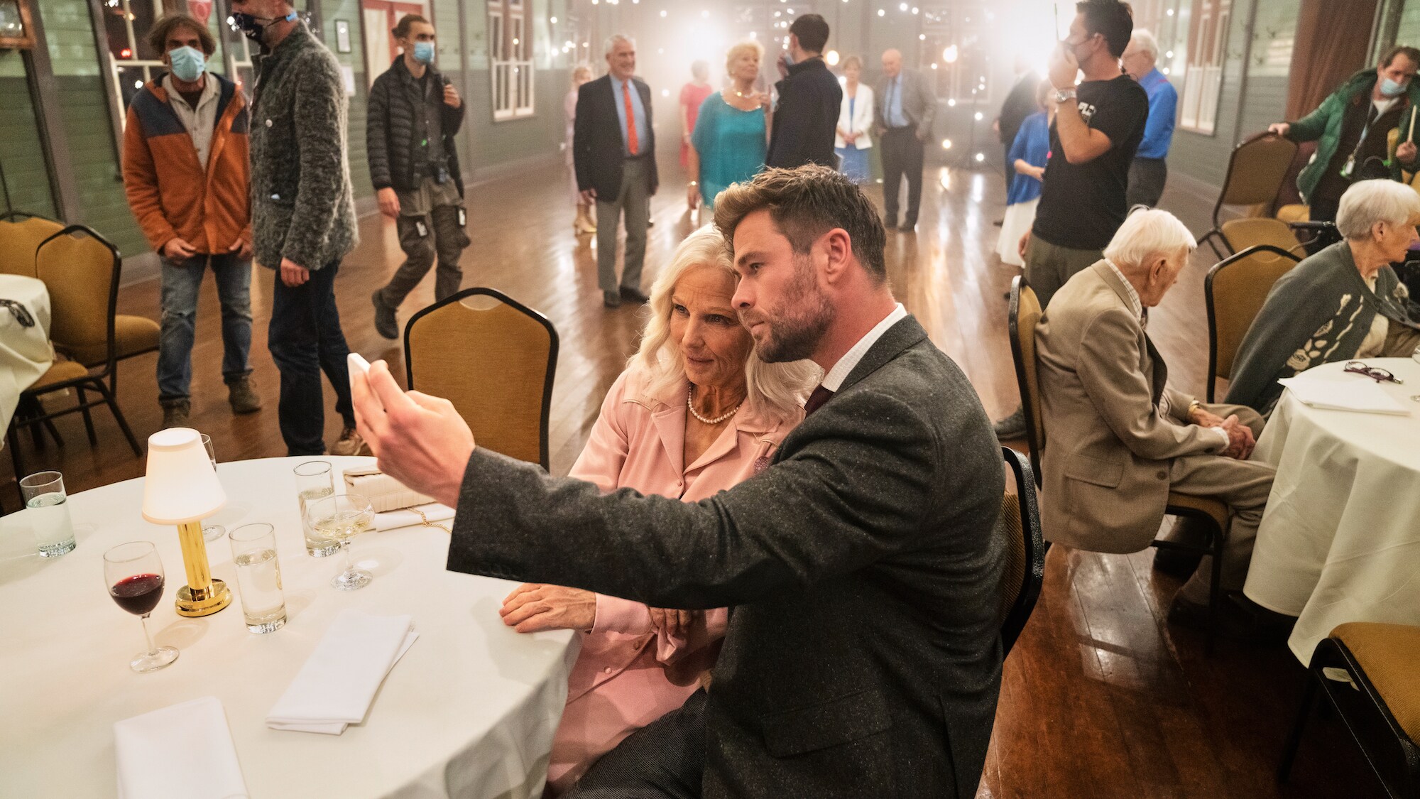 Chris Hemsworth and Elsa take a selfie at the dance. (National Geographic for Disney+/Craig Parry)