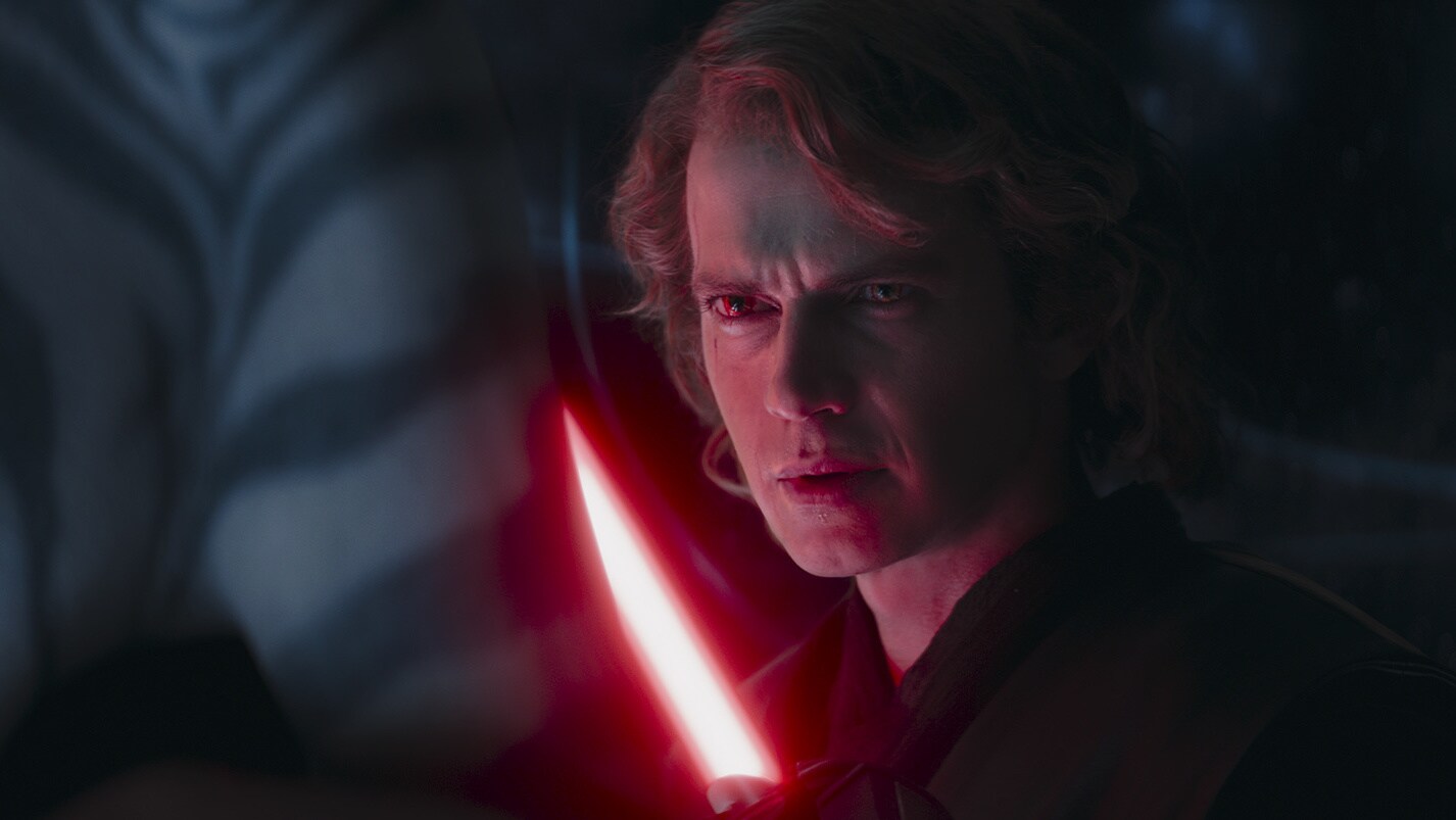 He stalks forward, Sith eyes glaring and his image flashing to that of Darth Vader. Ahsoka, howev...