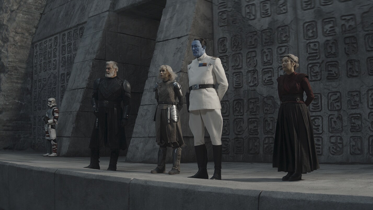 Stormtroopers stand at attention as Grand Admiral Thrawn disembarks. After he discusses plans to ...