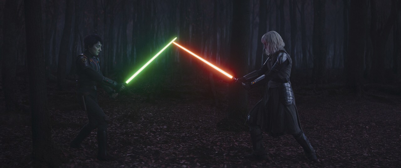 Sabine and Shin with their lightsaber's ignited