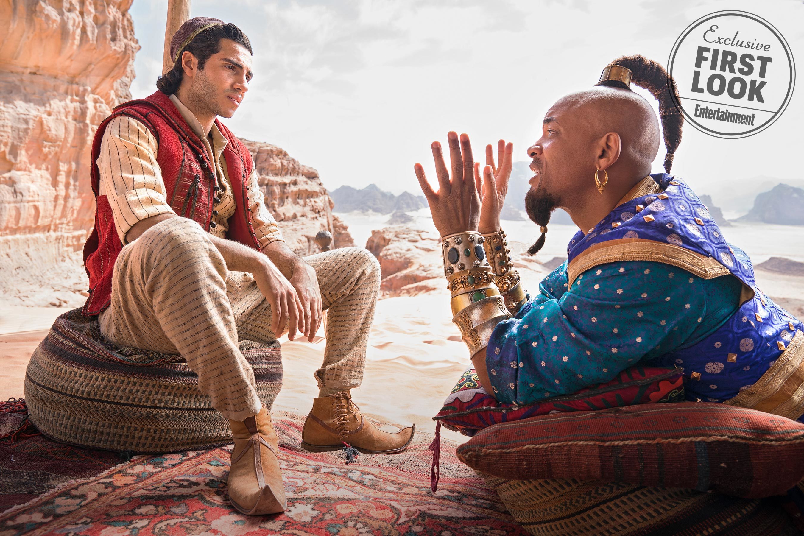 Mena Massoud as Aladdin and Will Smith as Genie