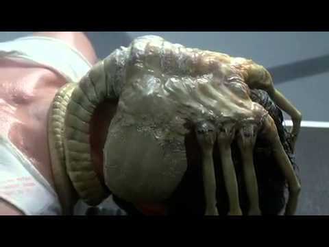 Image of a woman with an alien where her head should be, from the movie Alien