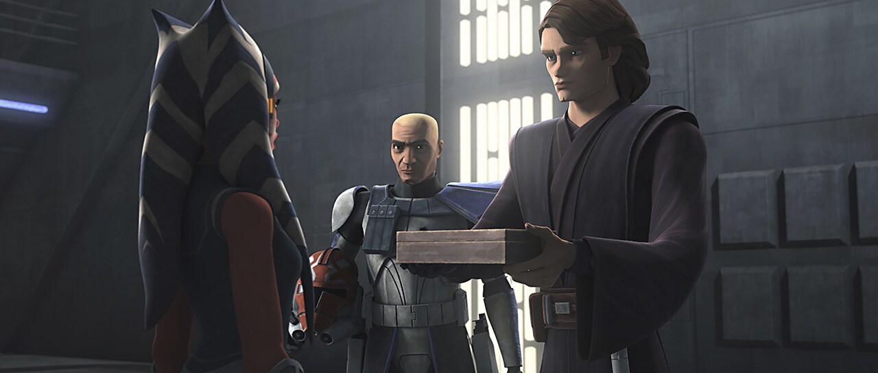 Anakin presents Ahsoka with a plain box, a gift for his friend.