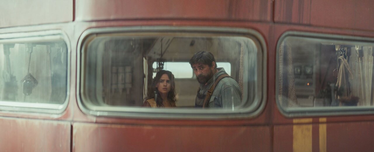 Bix and Brasso look out the window of their mobile-haus.