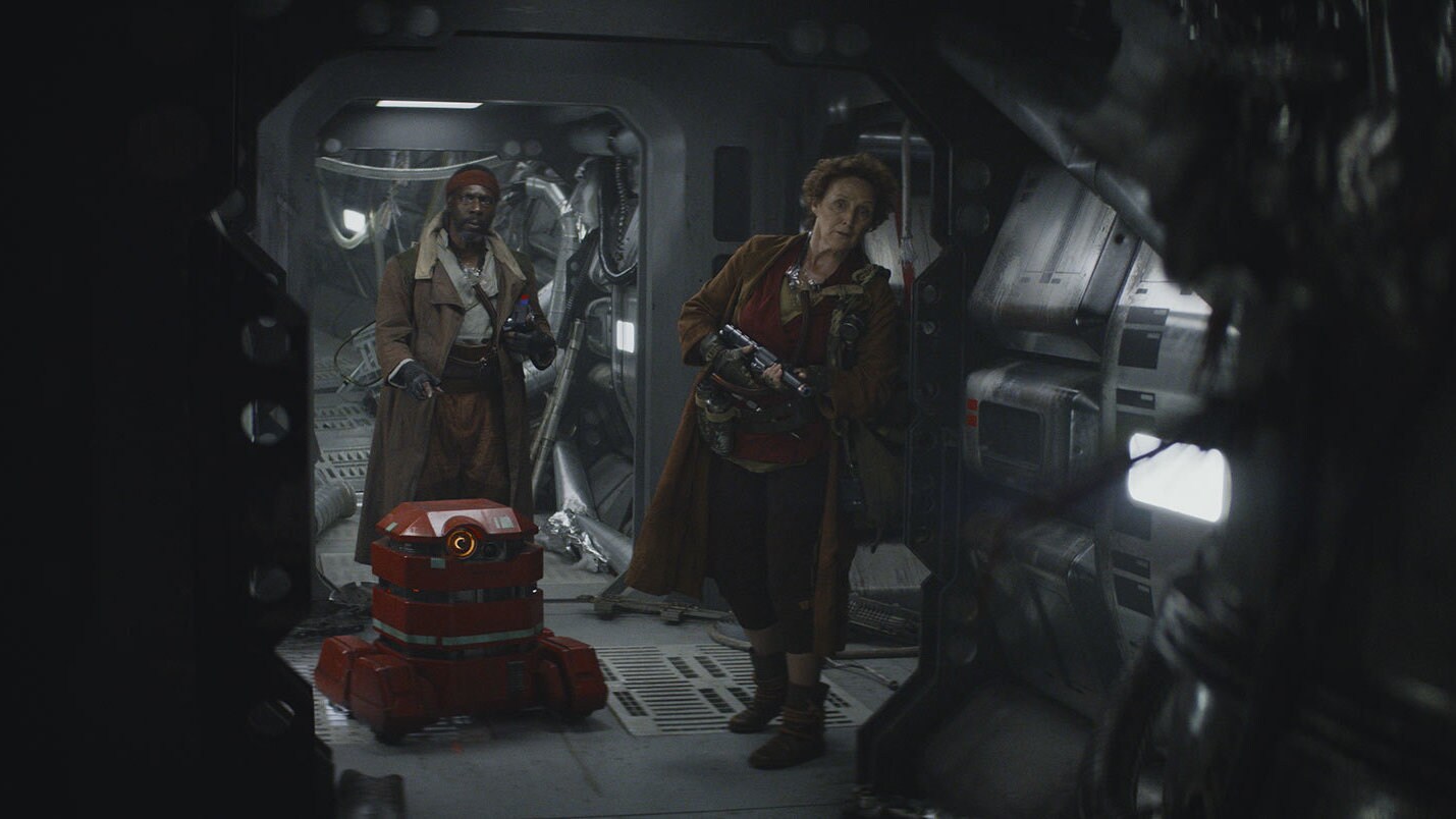 In the past, Maarva Andor and her husband, Clem, find Cassian in the downed transport. Maarva adm...