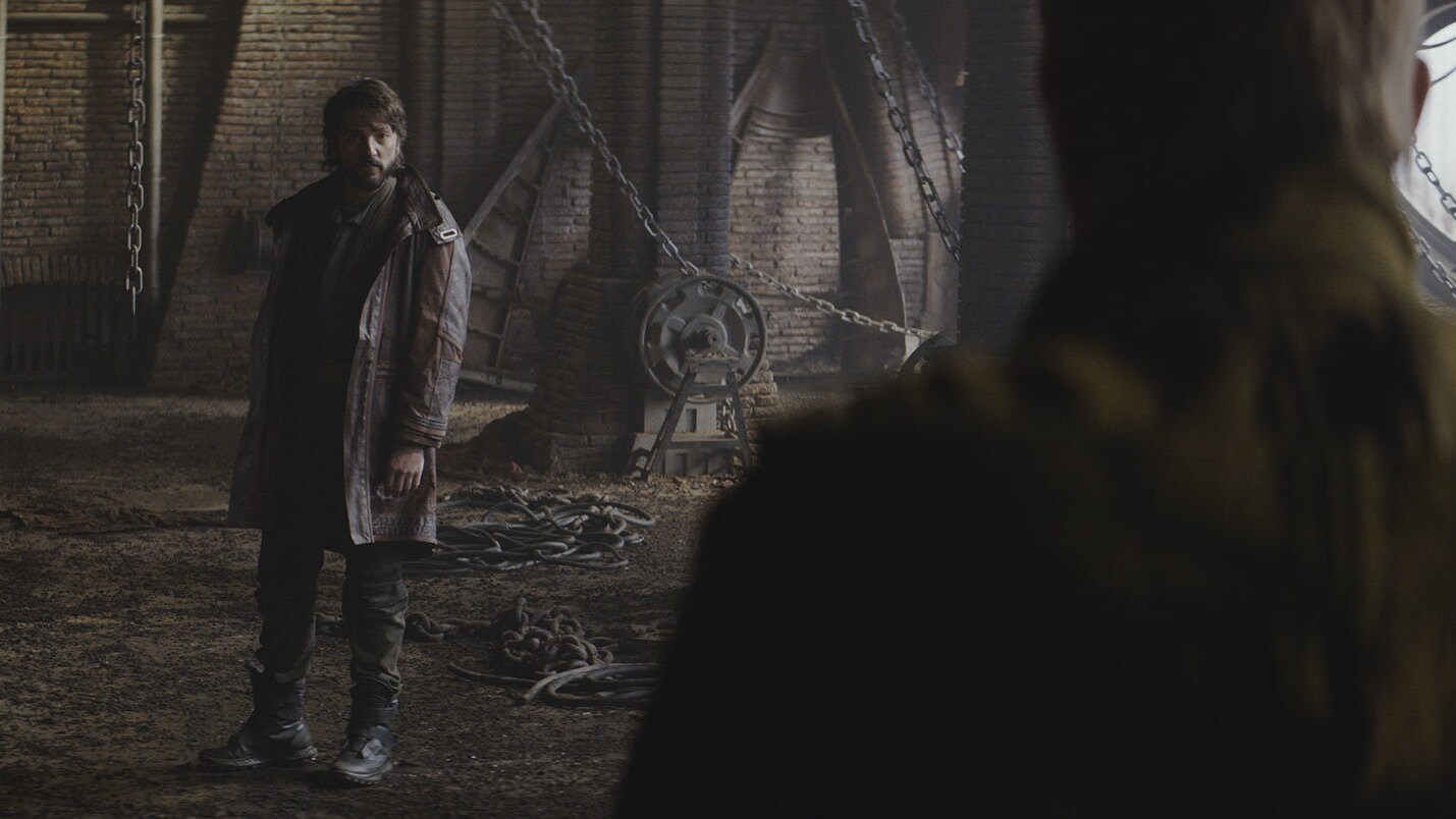 Cassian meets with Luthen in an abandoned warehouse. He knows much about Andor, and offers a chan...