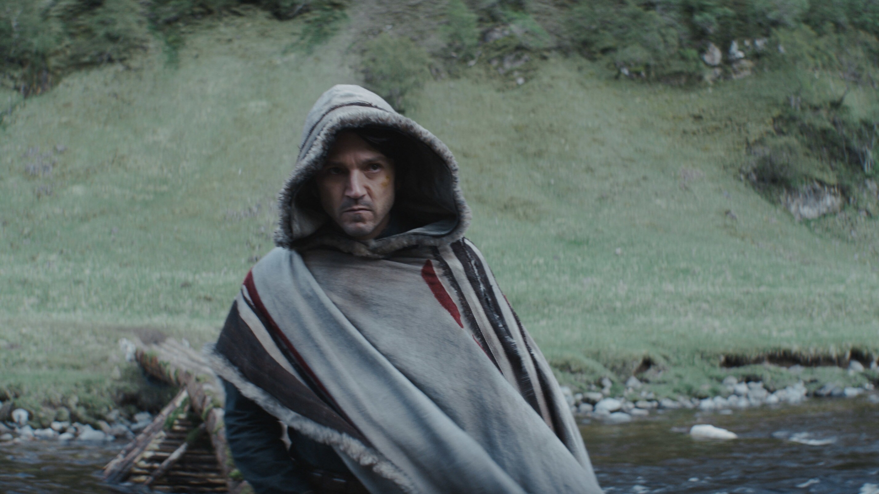 Andor in a cloak.