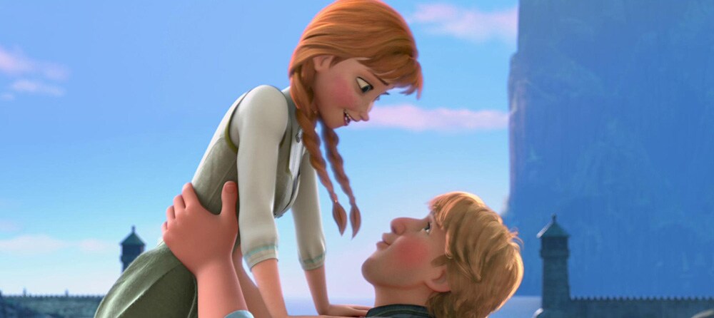 Animated Character Anna being held in the air by Kristoff from the film "Frozen"