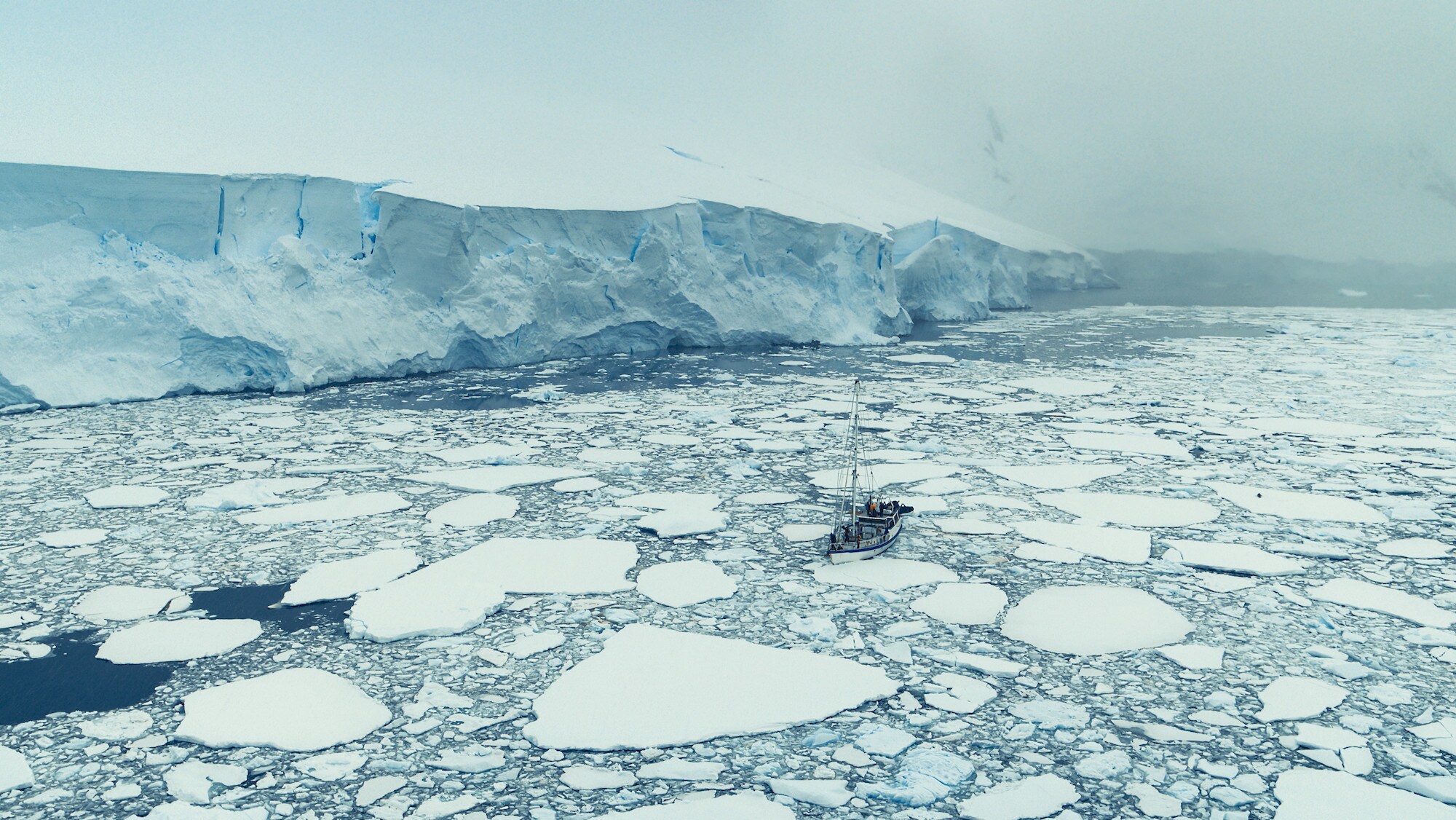 The Australis sailing through sea ice. (credit: National Geographic for Disney+/Bertie Gregory)