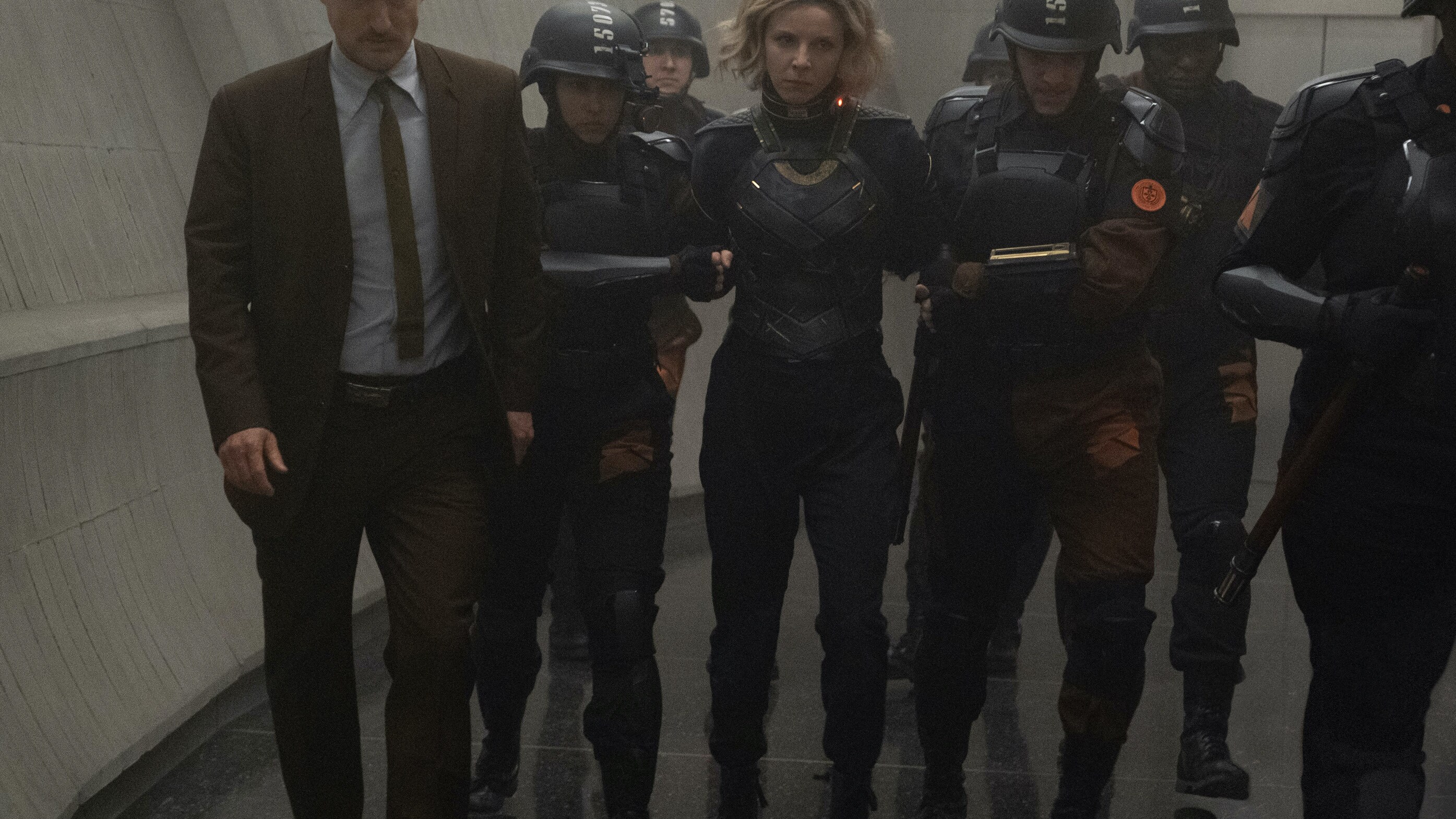 (L): Mobius (Owen Wilson) and (center): Sylvie (Sophia Di Martino) in Marvel Studios' LOKI, exclusively on Disney+. Photo by Chuck Zlotnick. ©Marvel Studios 2021. All Rights Reserved.