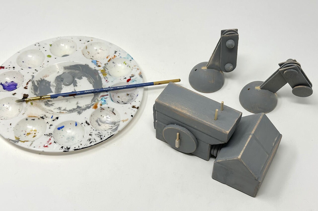 Step 25: Paint the weapons, wood filler, and any spots you might have missed. Let dry.