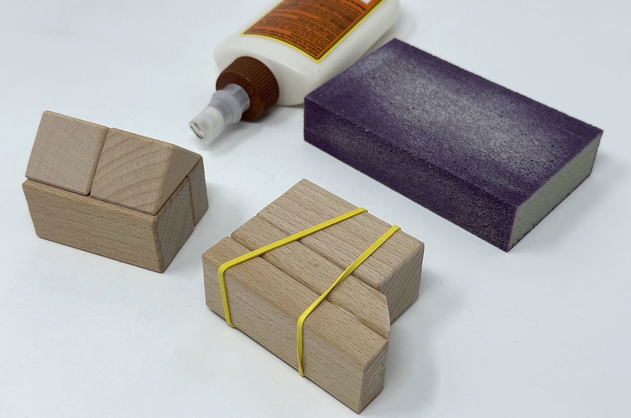 Step 9: Glue the head pieces together with the angled block sandwiched between the other two. Let dry.