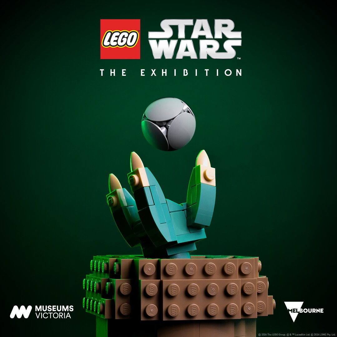 teaser image for the LEGO Star Wars Exhibition featuring Grogu's hand and a grey sphere.