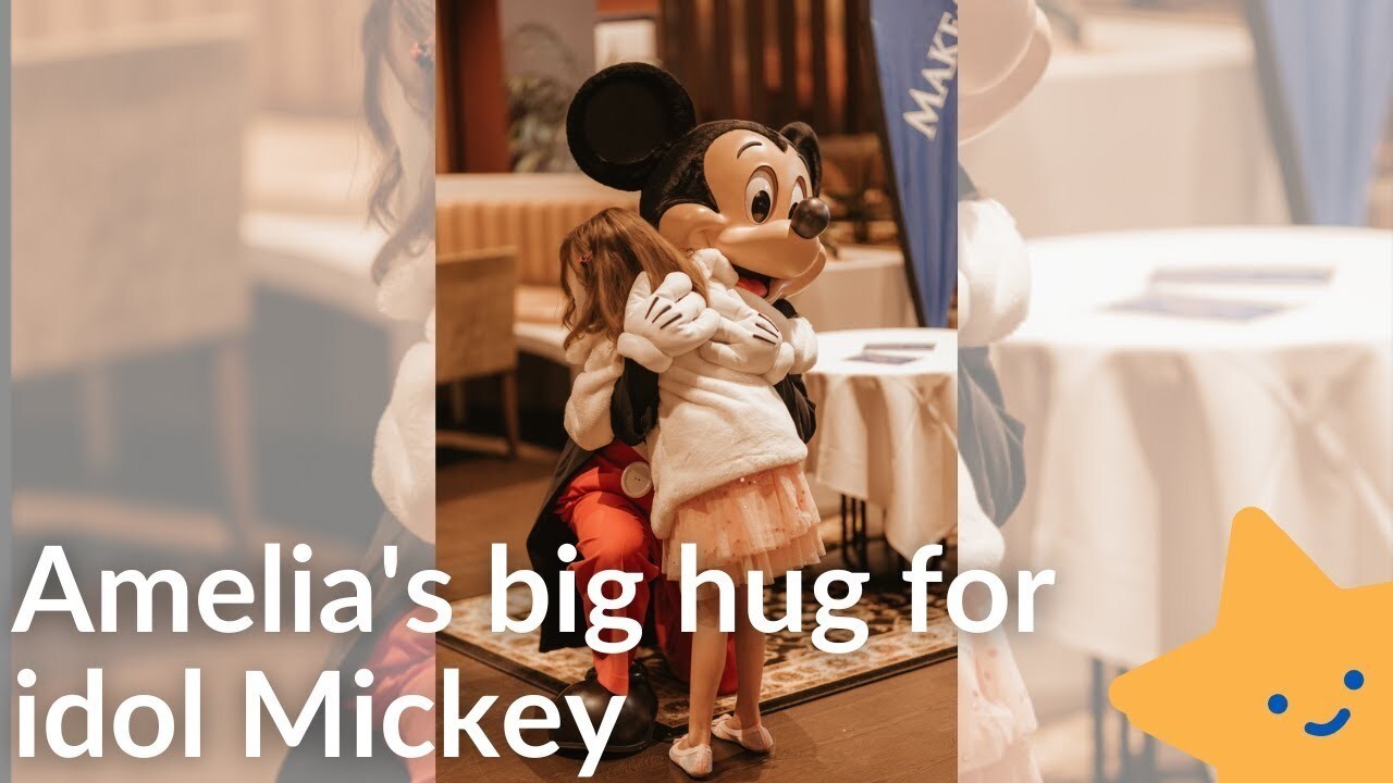 Amelia's Big Hug with Mickey Mouse.