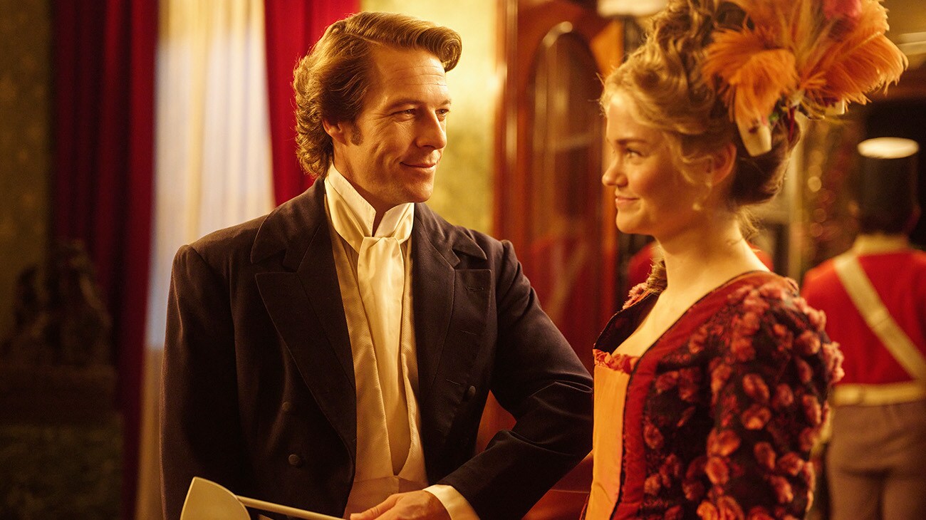 Luke Bracey and Maia Mitchell in a scene from The Artful Dodger, Season 2.