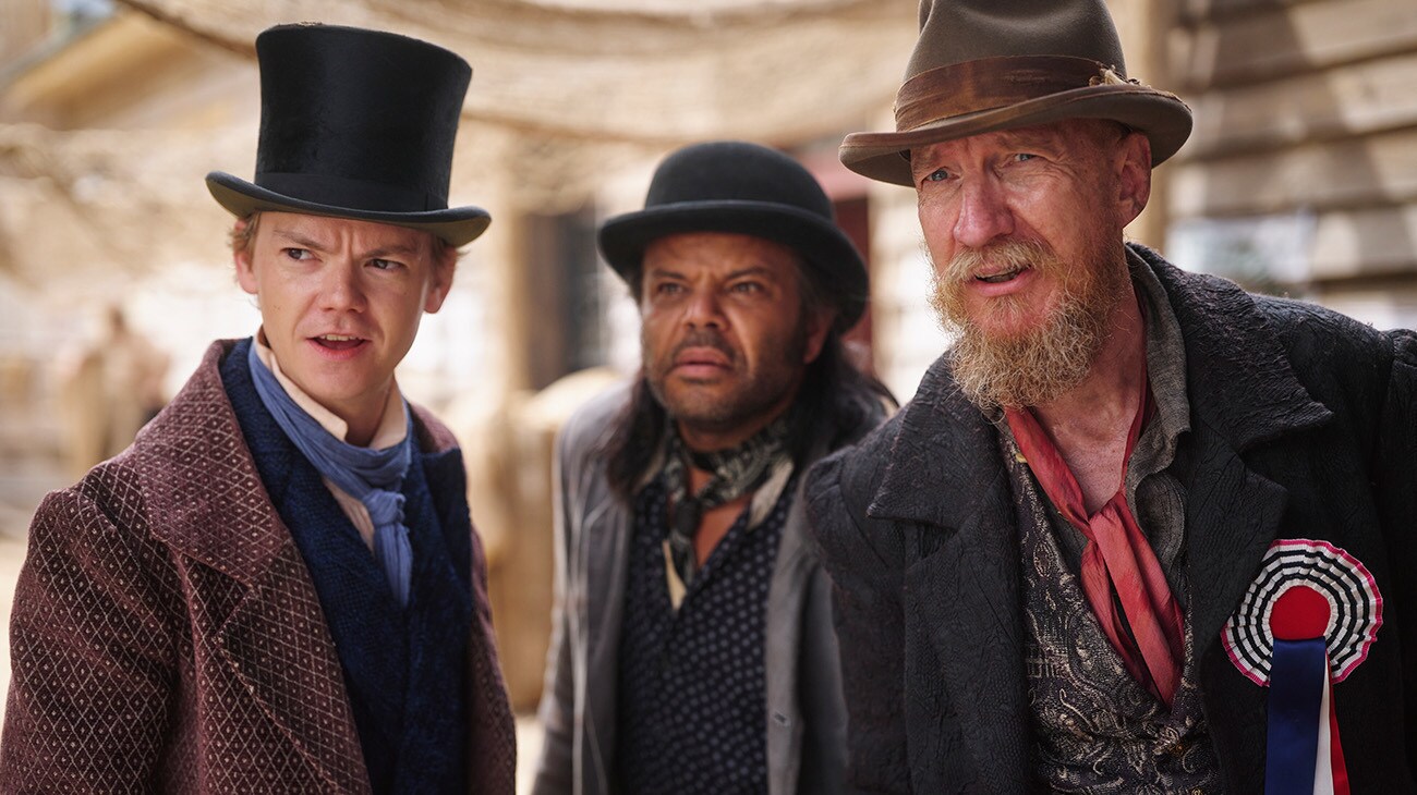 Thomas Brodie-Sangster, Luke Carroll and David Thewlis in a scene from Season 2 of The Artful Dodger on Disney+.