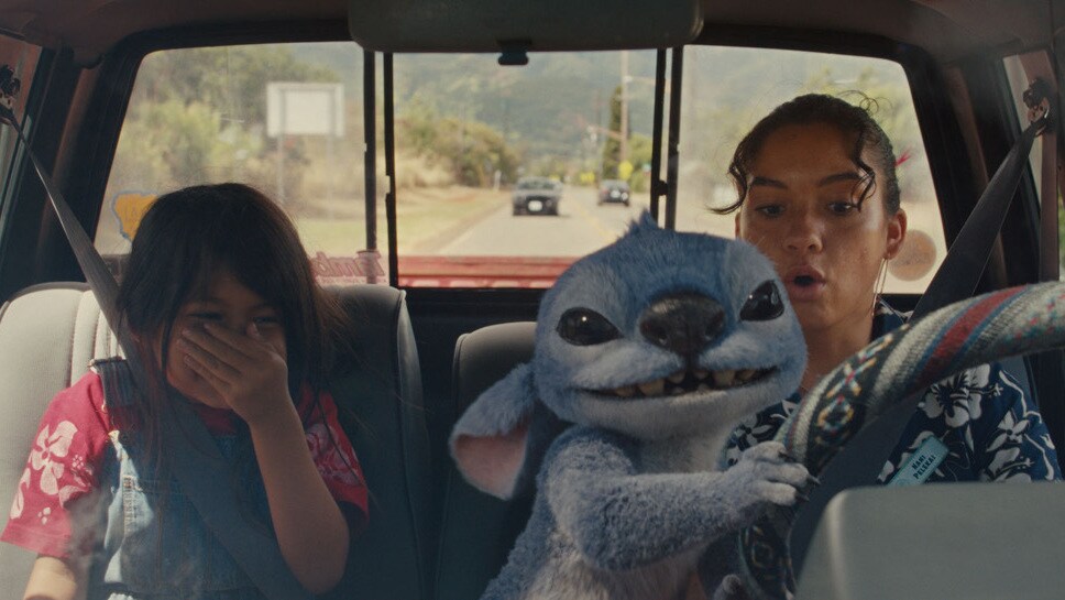 (L-R) Maia Kealoha as Lilo, Stitch and Sydney Agudong as Nani in Disney’s live-action LILO & STITCH. Photo courtesy of Disney. © 2025 Disney Enterprises Inc. All Rights Reserved.