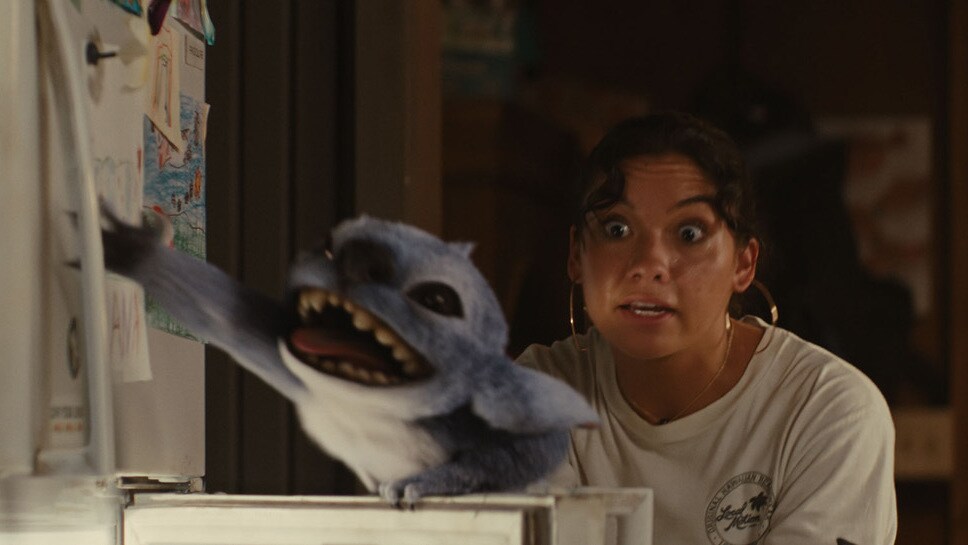 (L-R) Stitch and Sydney Agudong as Nani in Disney’s live-action LILO & STITCH. Photo courtesy of Disney. © 2025 Disney Enterprises Inc. All Rights Reserved.