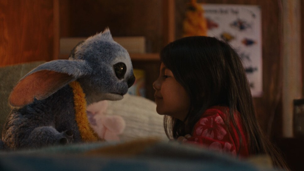 (L-R) Stitch and Maia Kealoha as Lilo in Disney’s live-action LILO & STITCH. Photo courtesy of Disney. © 2025 Disney Enterprises Inc. All Rights Reserved.