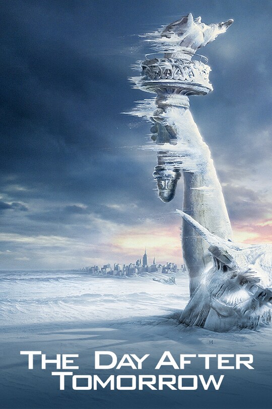The Statue of Liberty's torch stands frozen above endless amounts of snow, feint hints of New York City in the background.