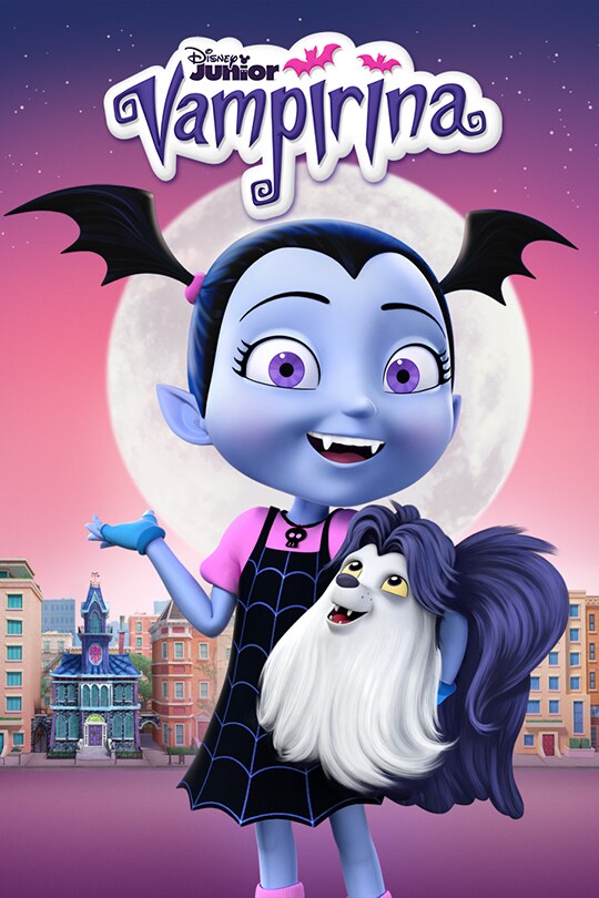 Vee, the animated star of Disney's Vampirina, stands smiling and holding her pet.