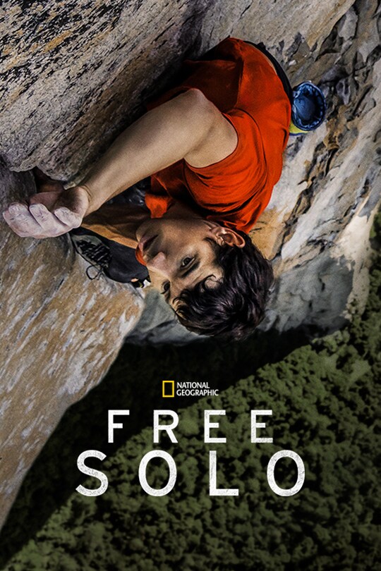 Free Solo climber Alex Honnold hangs precariously off the side of El Capitan in Yosemite National Park.