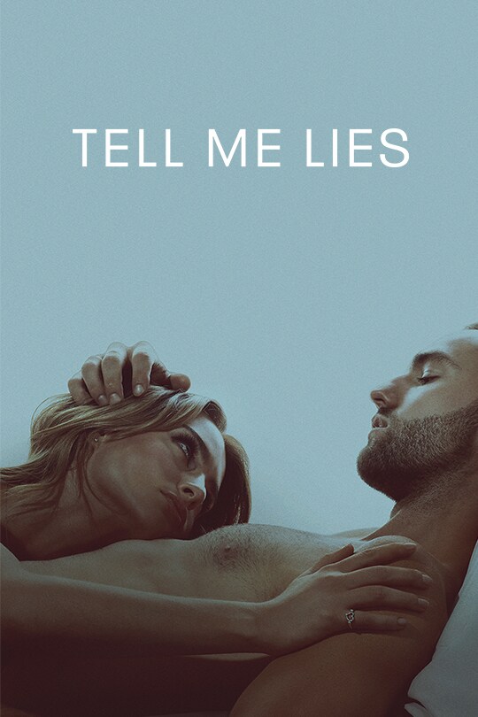 The two actors from series Tell Me Lies (2022) lay on a bed, the woman's head against the mans chest as they look at each other. The background is a muted blue/grey.