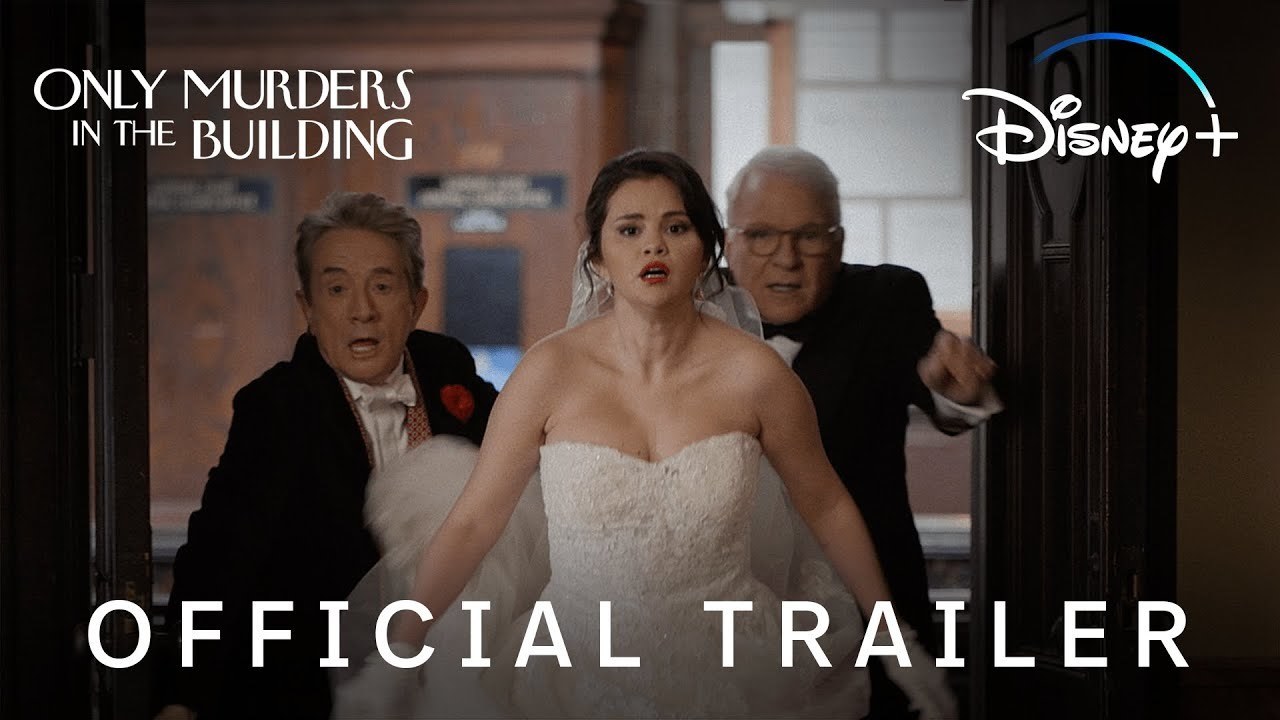 Selena Gomez, Steve Martin and Martin Short look surprised as they stop in an archway.