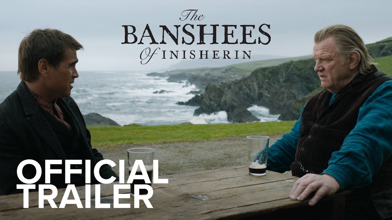 Colin Farrell as Pádraic and Brendan Gleeson as Colm look at each other with dismay on a wooden bench with two empty beer glasses, in the background is Ireland's rustic and rocky coastline with waves crashing, 