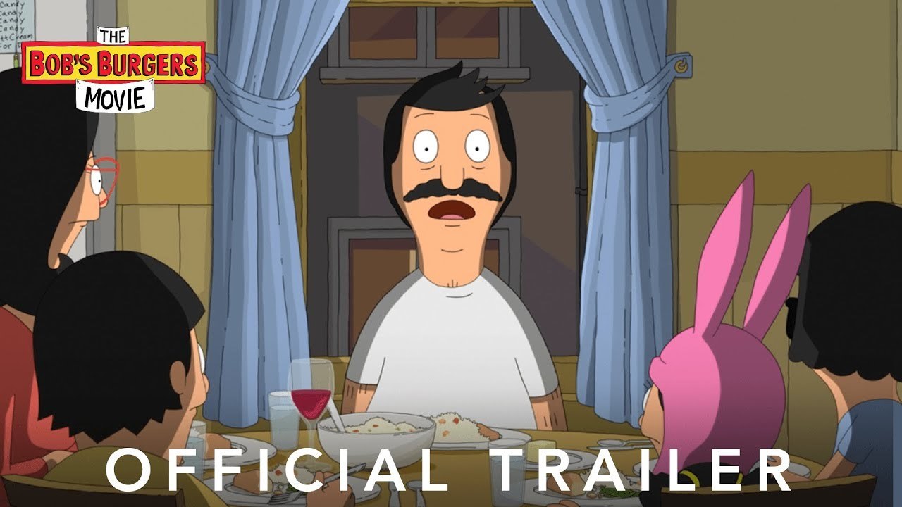 Bob of Bob's Burgers sits at the dinner table looking stunned, mouth wide open.