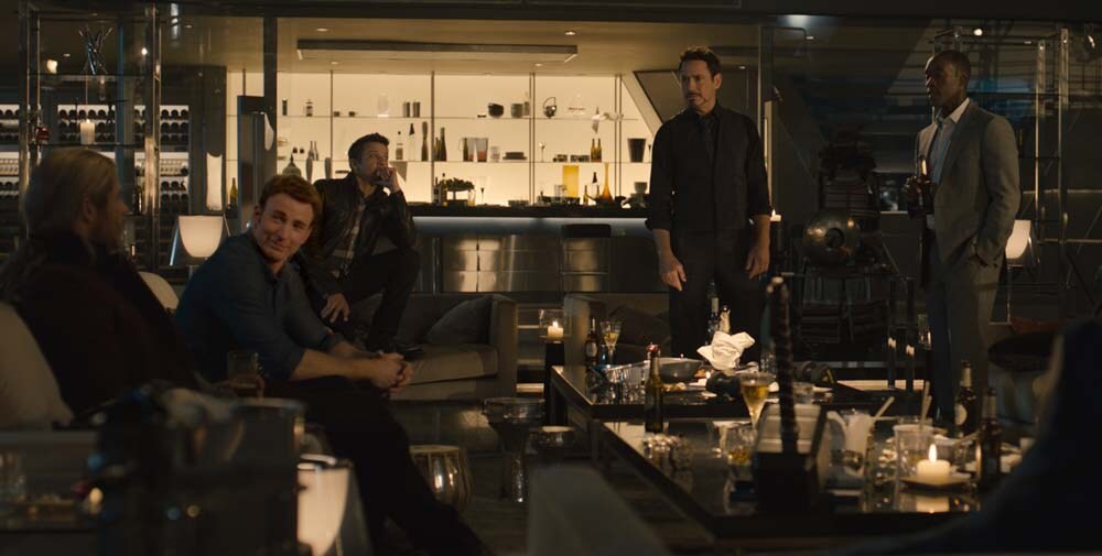 The Avengers are pictured sitting down together in Tony Stark's lounge bar in a scene from Avengers: Age of Ultron.