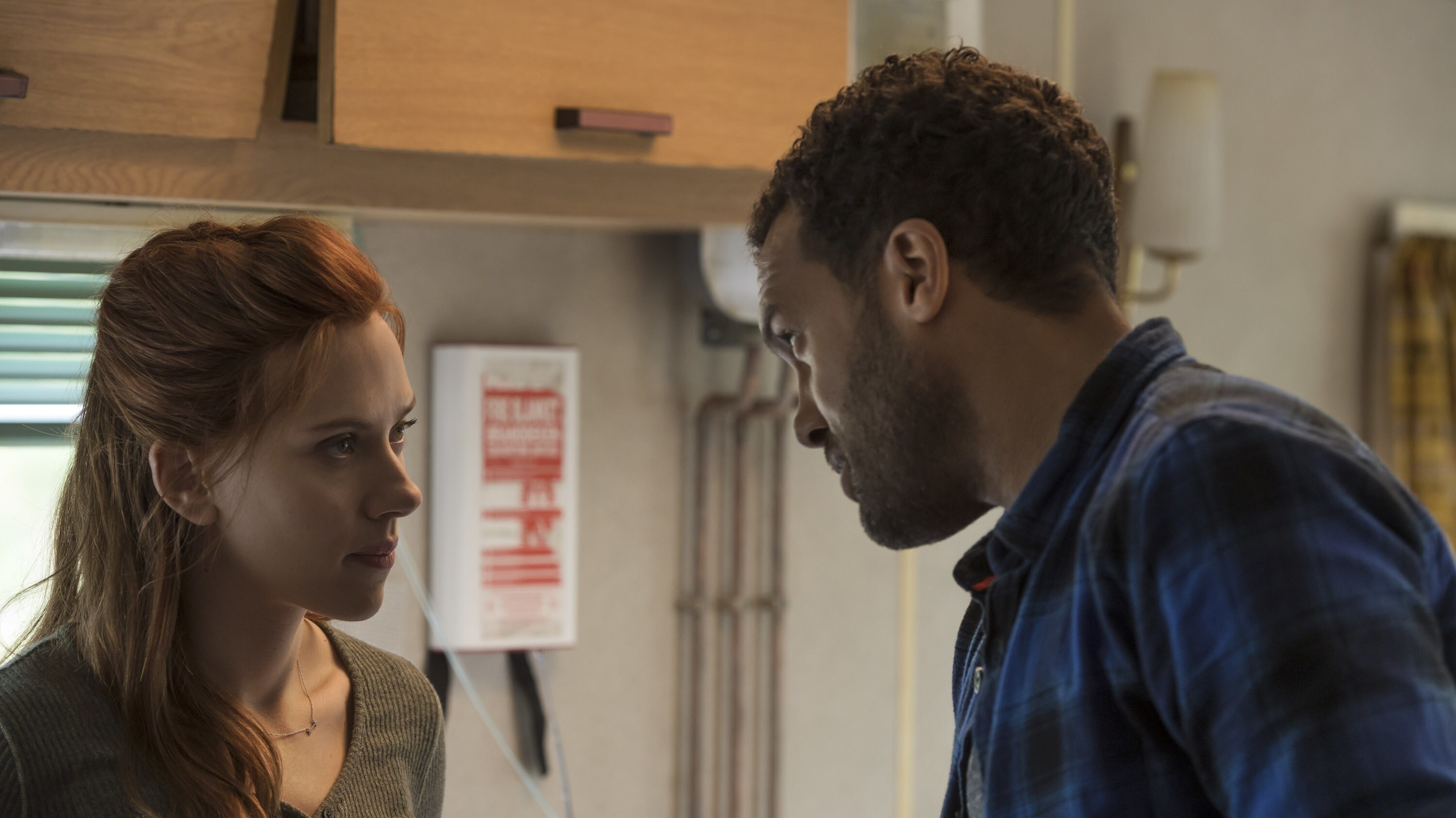 (L-R): Black Widow/Natasha Romanoff (Scarlett Johansson) and Mason (O-T Fagbenle) in Marvel Studios' BLACK WIDOW, in theaters and on Disney+ with Premier Access. Photo by Jay Maidment. ©Marvel Studios 2021. All Rights Reserved