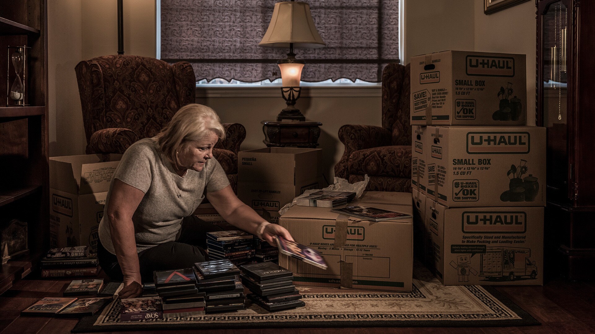 Michelle John, the emeritus superintendent of Paradise Schools, as she packs her home and prepares to move away from the town in the wake of the fire. (Photo by National Geographic/Pete Muller)