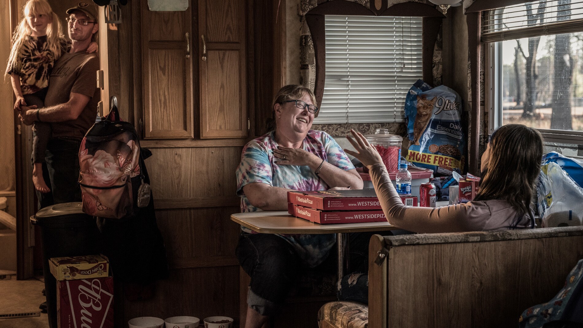 Shannon Tutor and her family in their trailer in Paradise, California (National Geographic/Pete Muller)