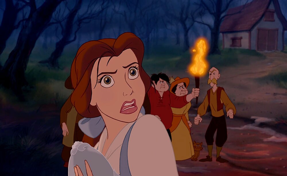 Belle in front of an angry mob in the film "Beauty and the Beast"