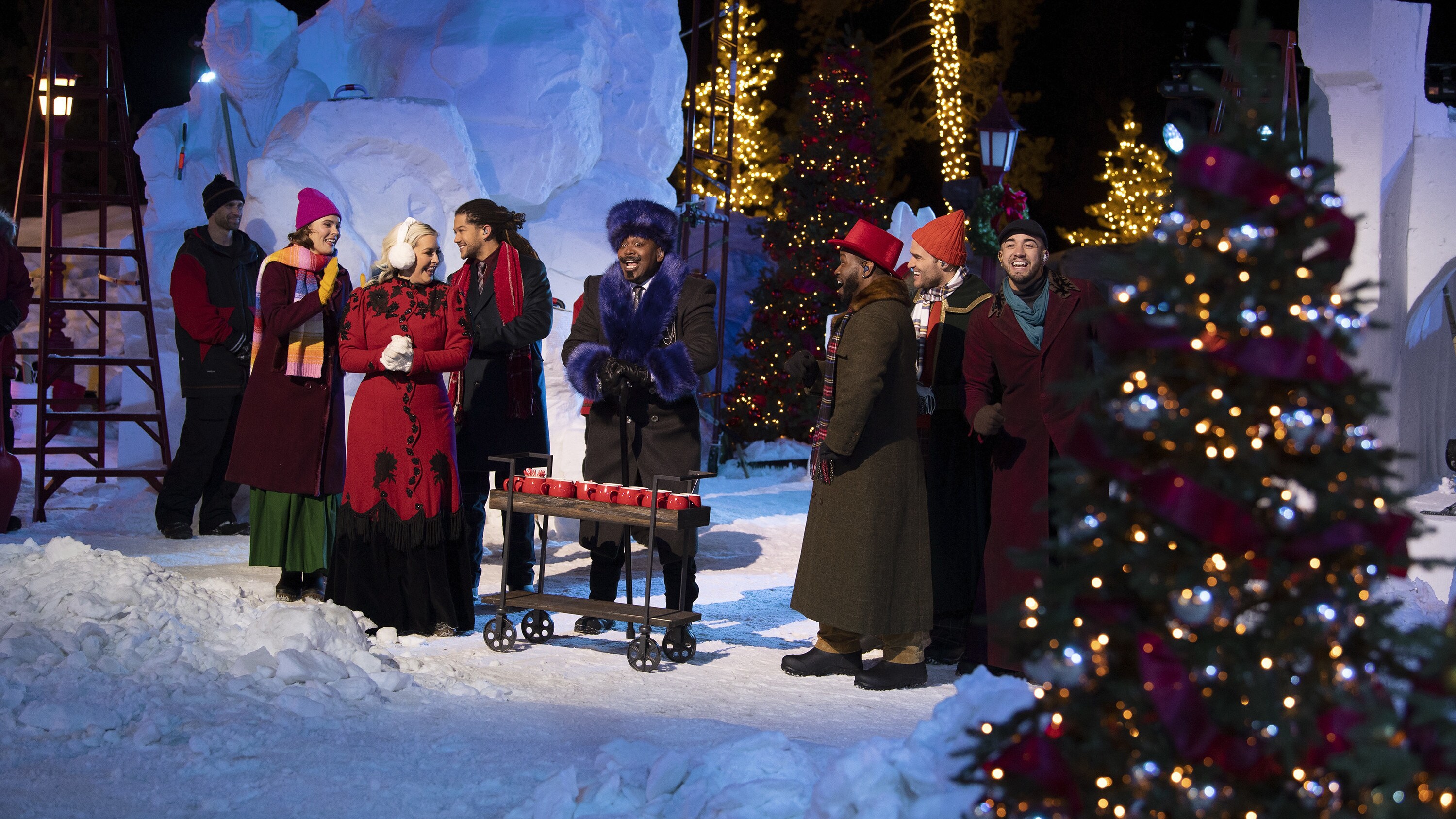 BEST IN SNOW. Host Titus Burgess (center) and D'Cappella. (Disney/Todd Wawrychuk)