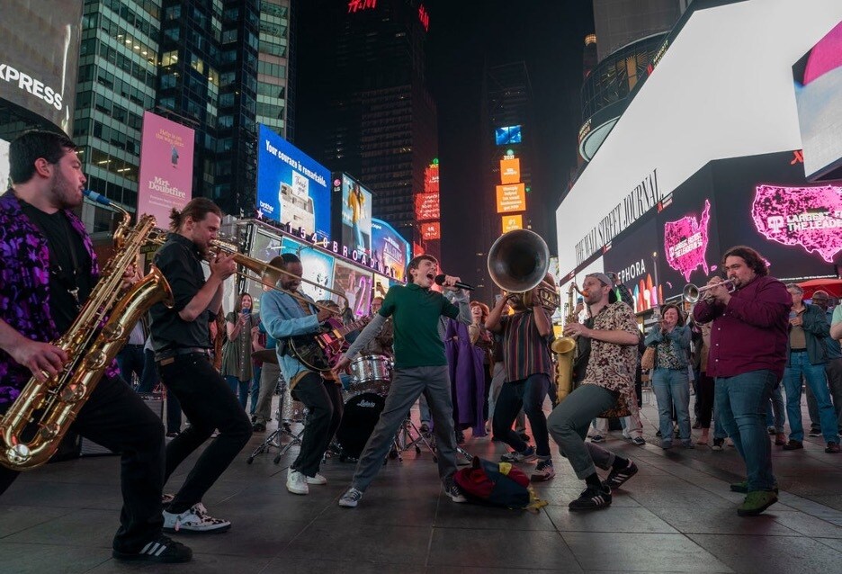 Nate performs on 42nd Street with a band in Disney's Better Nate Than Never
