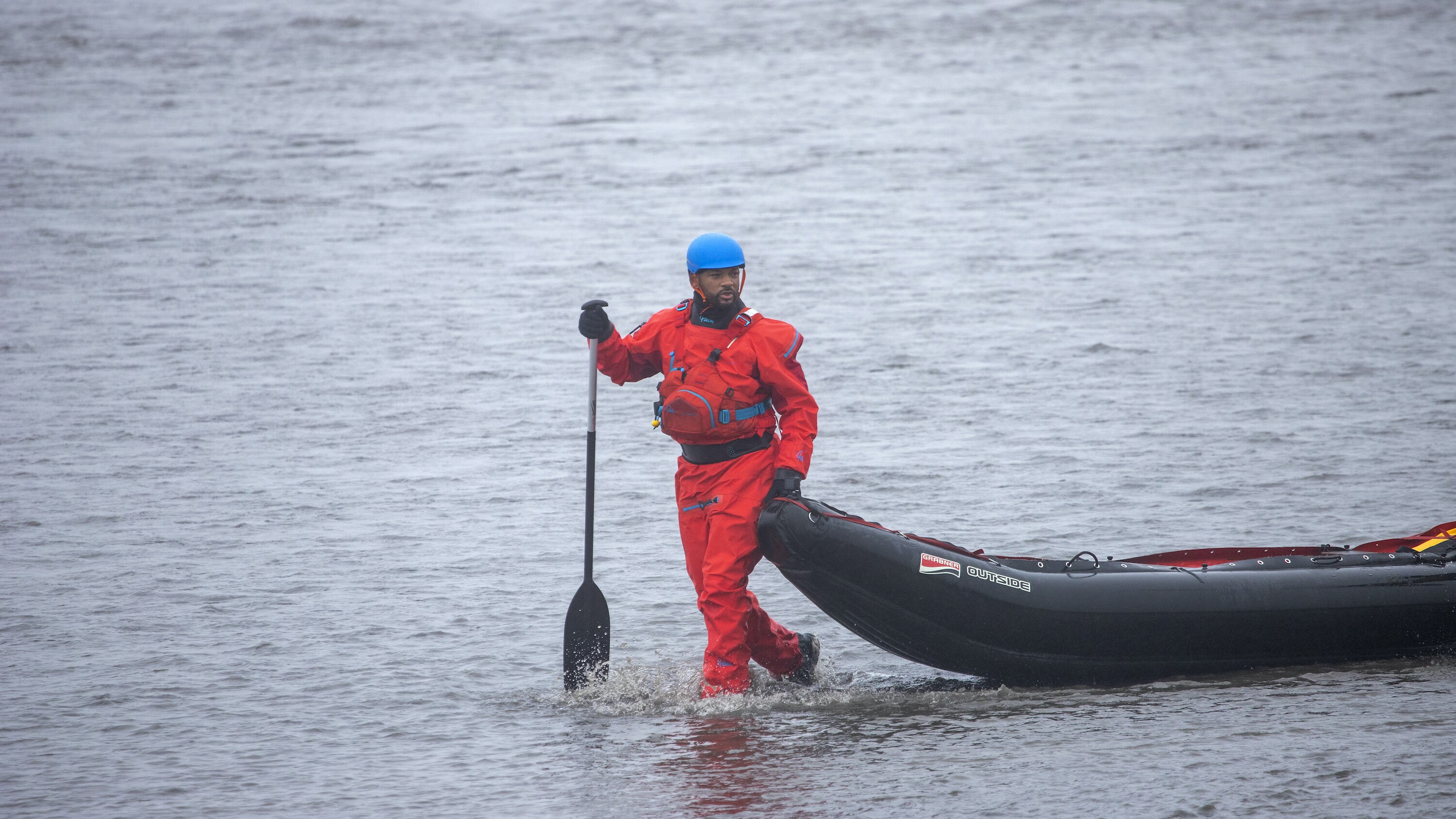 Will Smith pulls his kayak from the braided river in Iceland.  (National Geographic for Disney+/Bragi Þór Jósefsson)