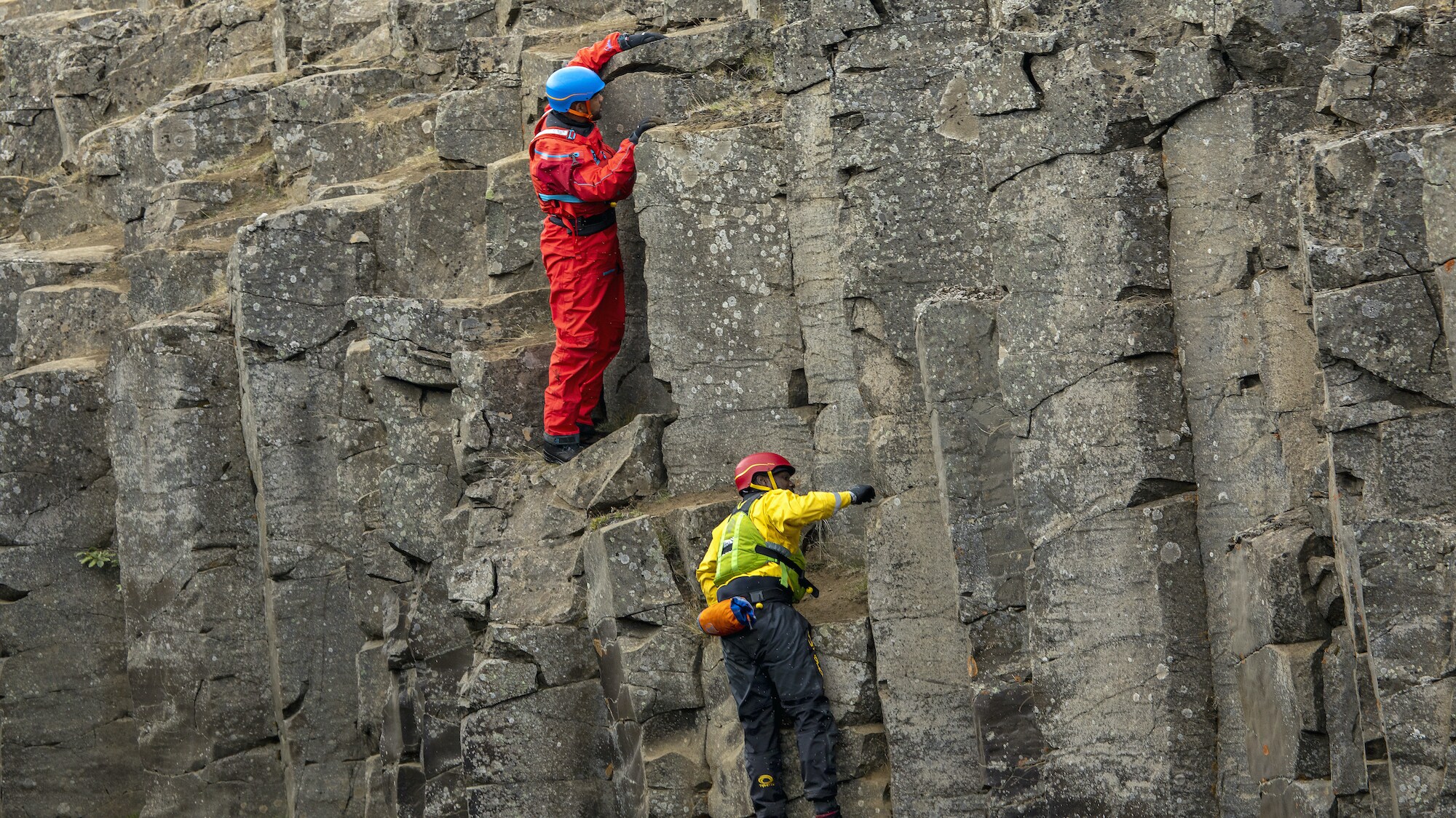 Will Smith and Dwayne Fields climbing at Studlagil basalt canyon.  (National Geographic for Disney+/Bragi Þór Jósefsson)