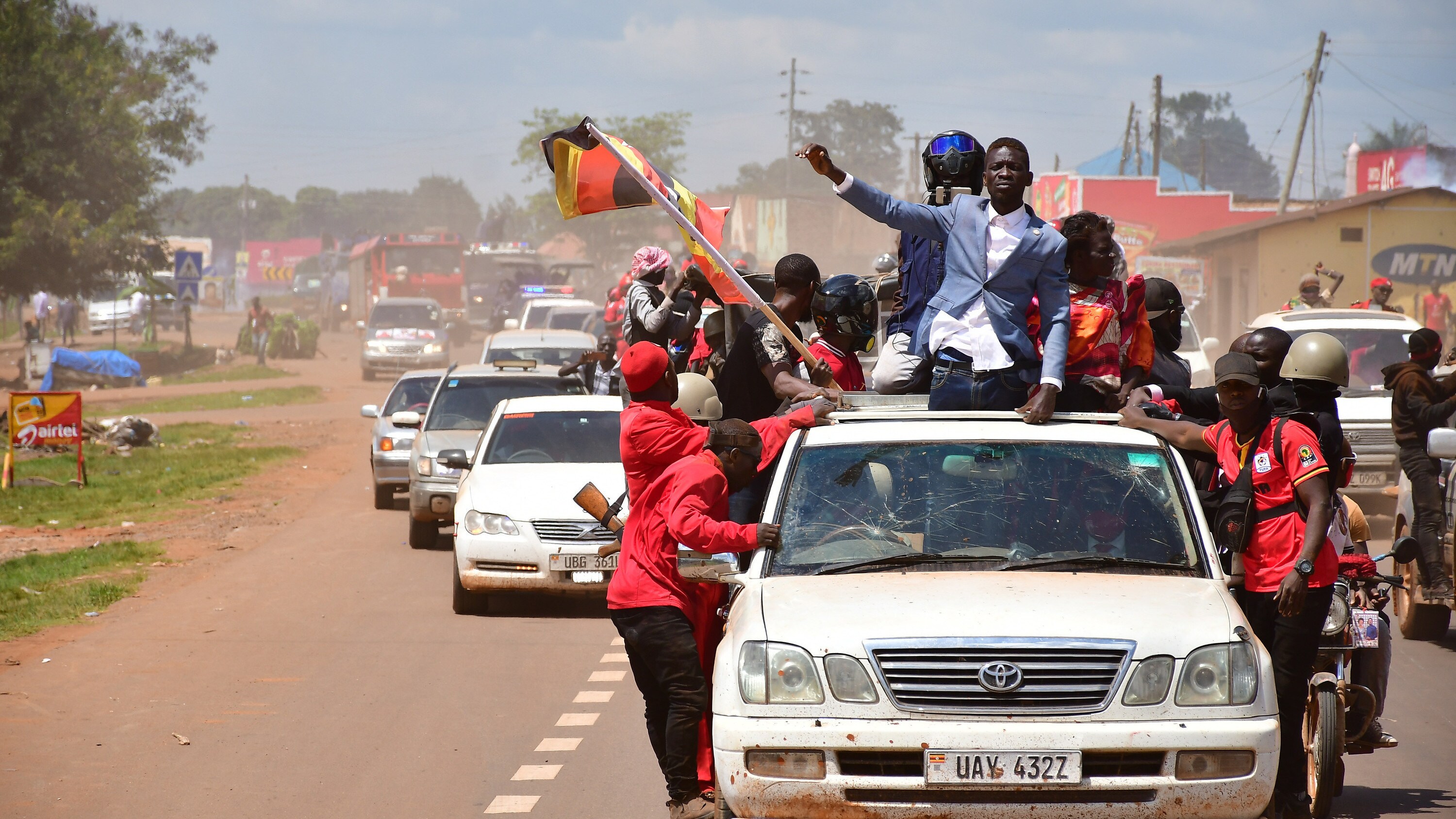 Bob i Wine atop his vehicle as he drove through Kayunga district during the presidential campaigns that were flawed with brutality and violence by security agencies, December 1, 2020. (photo credit: Lookman Kampala)