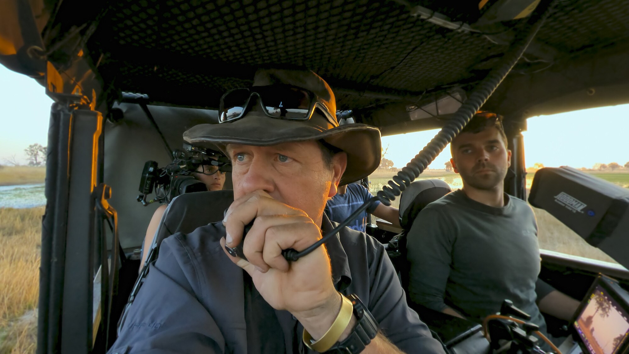 Duncan Rowles talking on radio with Sam Stewart next to him. (National Geographic for Disney+/Sam Stewart)