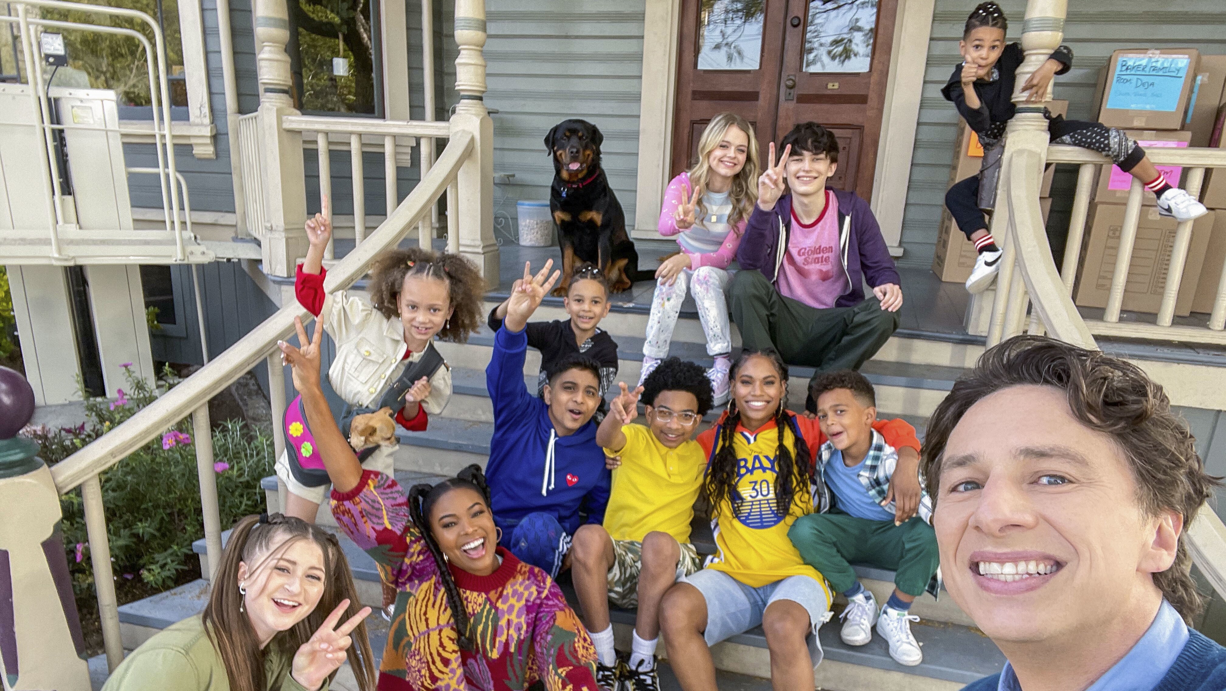 Kylie Rogers as Ella, Luke Prael as Seth, Caylee Blosenski as Harley, Sebastian Cote as Bronx, Gabrielle Union as Zoey Baker, Mykal-Michelle Harris as Luna, Christian Cote as Bailey, Aryan Simhadri as Haresh, Andre Robinson as DJ, Journee Brown as Deja, Leo Abelo Perry as Luca, and Zach Braff as Paul Baker on the set of 20th Century Studios' CHEAPER BY THE DOZEN, exclusively on Disney+. Photo courtesy of 20th Century Studios. © 2022 20th Century Studios. All Rights Reserved.